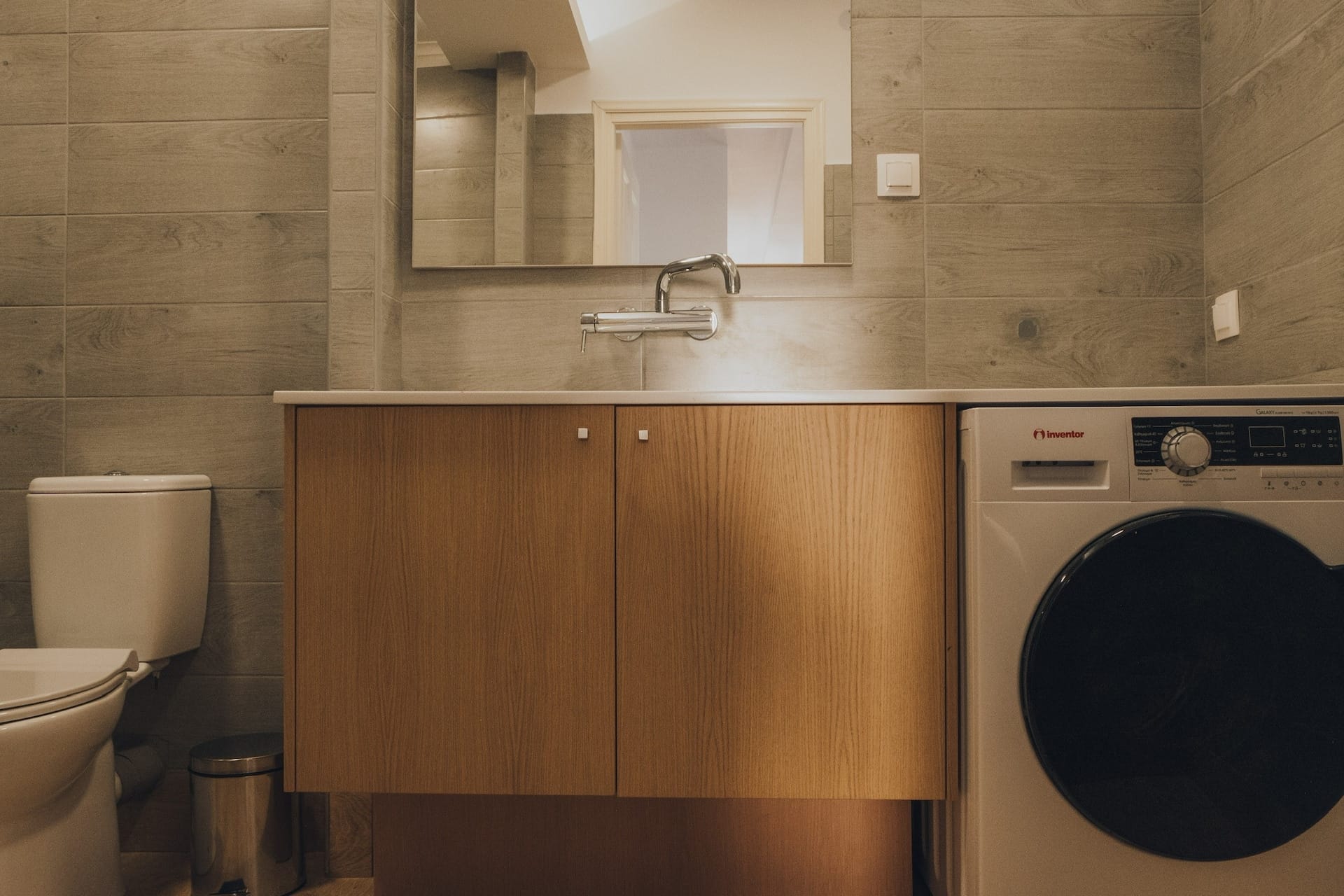 Utility area with the washing machine