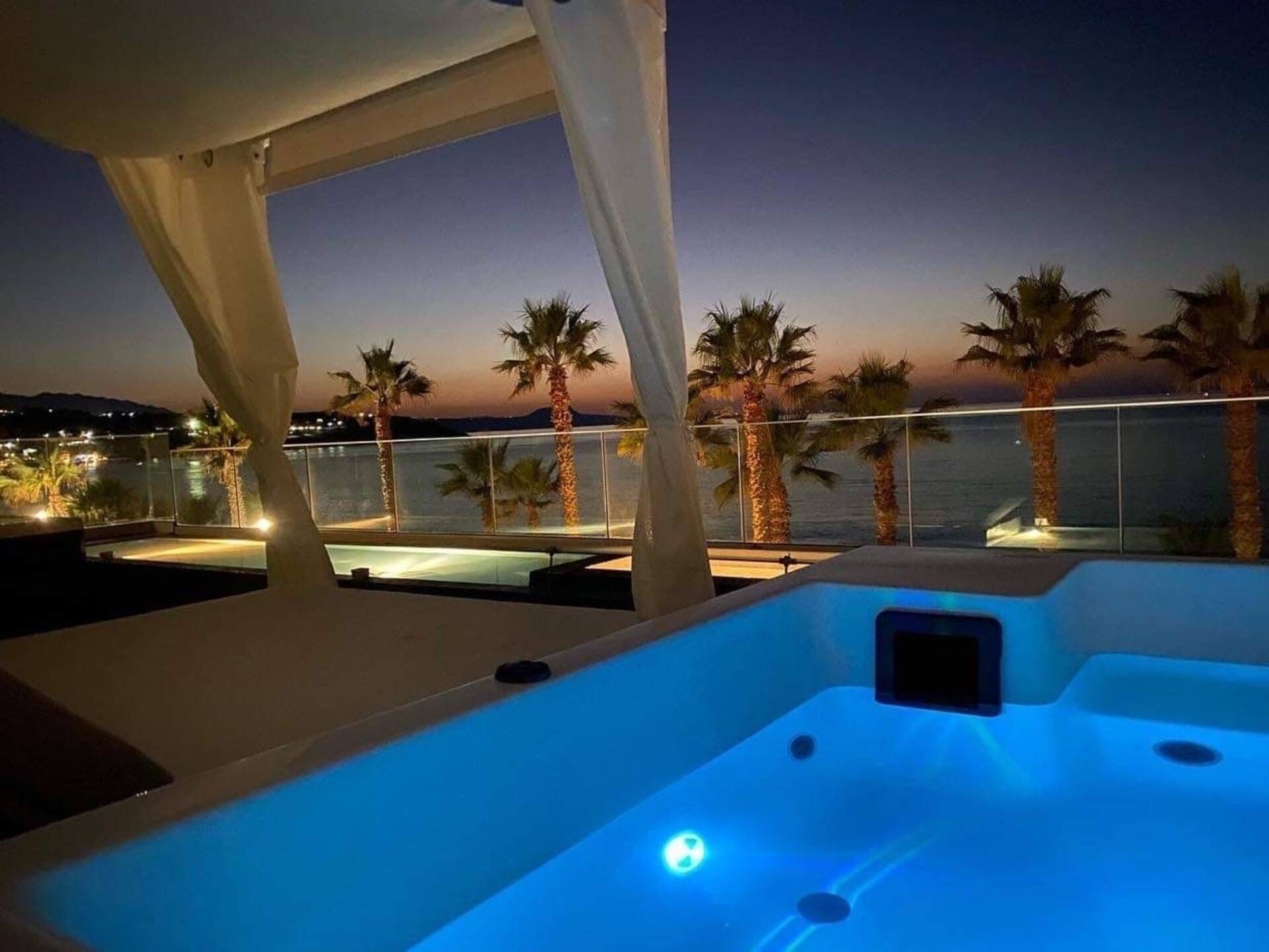 The deck jacuzzi lit up after dark
